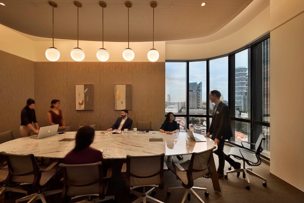 An organisation’s department heads coming together for a meeting
